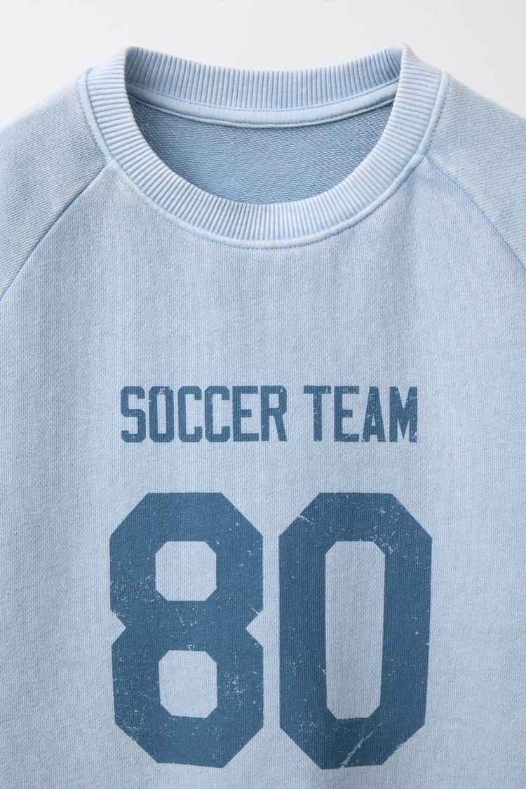 PRINTED RAGLAN SLEEVE T-SHIRT