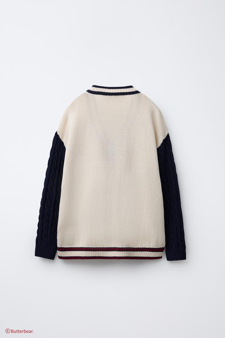 CABLE-KNIT CARDIGAN WITH BUTTERBEAR © EMBROIDERY