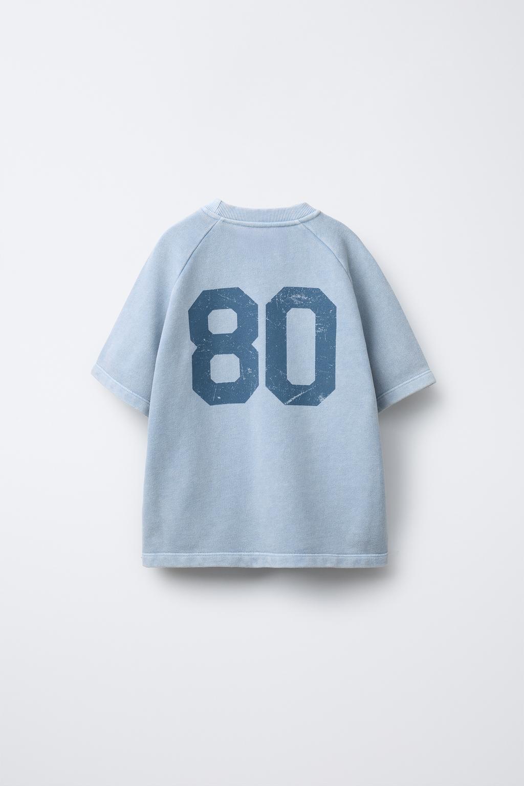 PRINTED RAGLAN SLEEVE T-SHIRT