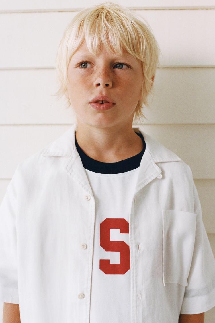 TEXT PRINT T-SHIRT WITH TRIM DETAIL